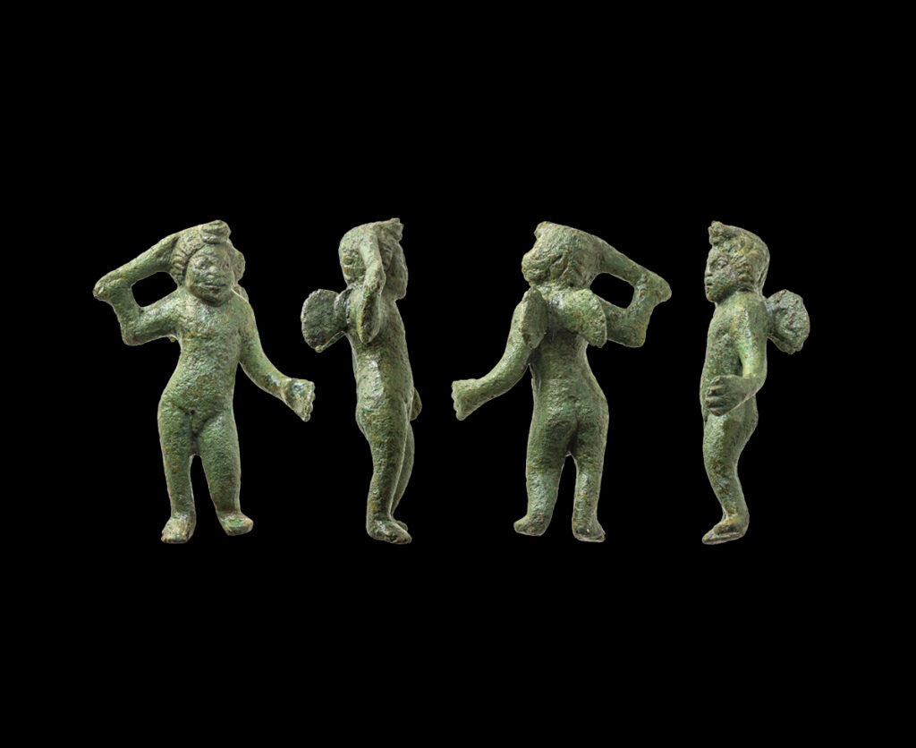 Photographs of the Cupid figurine, showing the front, back and 2 side views