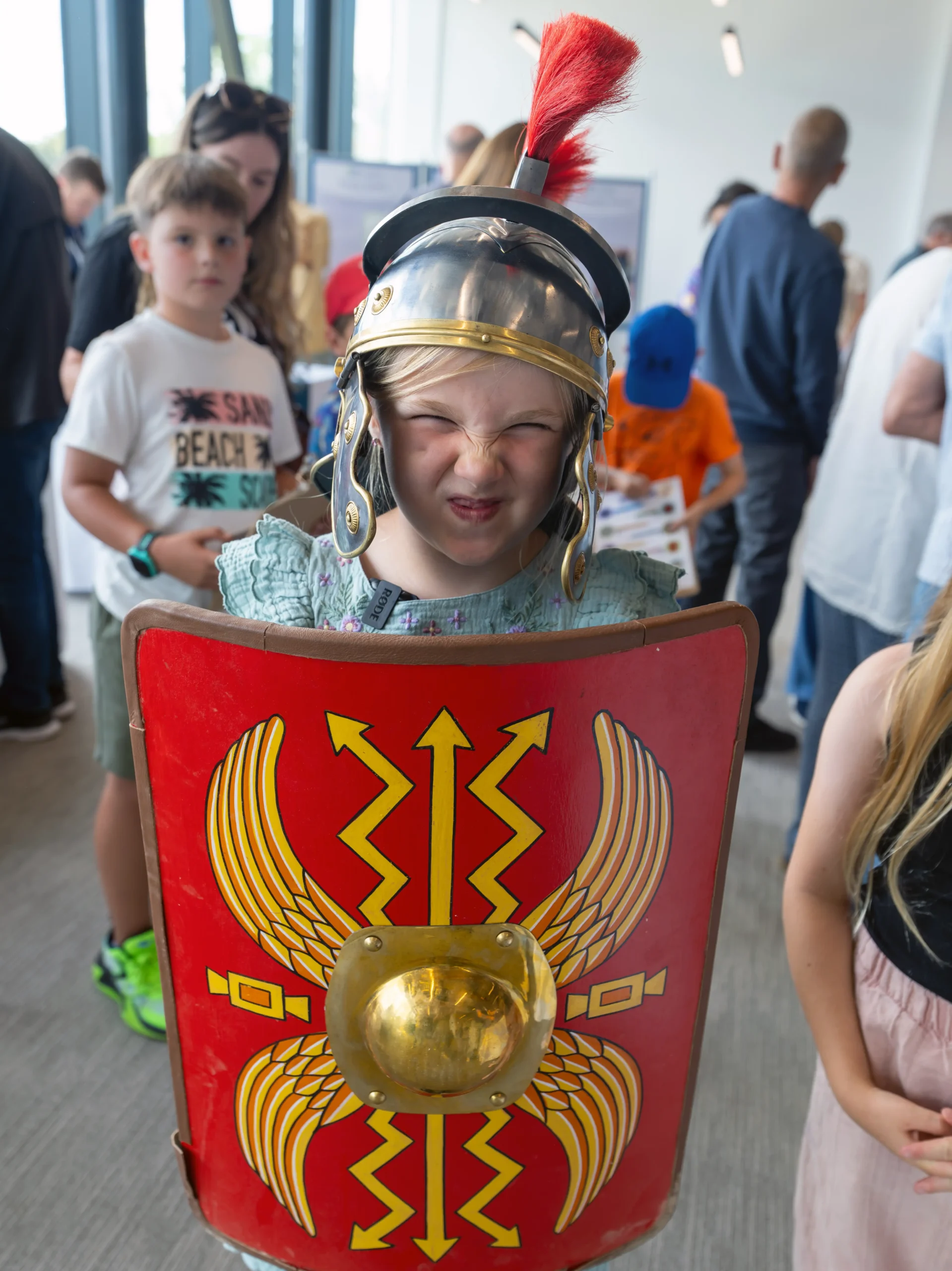 young visitor dressed as a roman solider